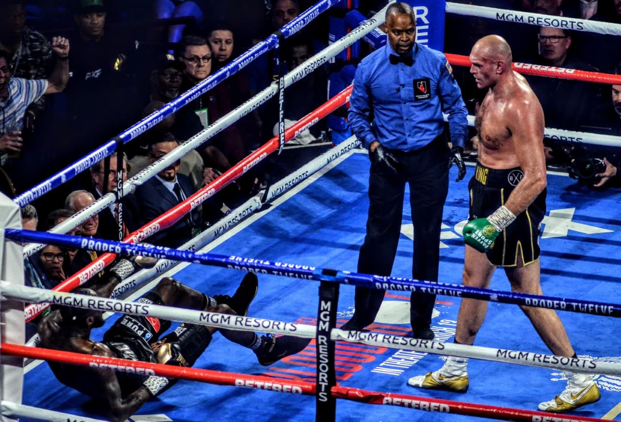 Tyson Fury dominates Deontay Wilder in their rematch, 7th round stoppage